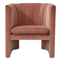 Plush pink accent chair with vertical ribbed pattern and smooth velvet finish, perfect for modern decor.