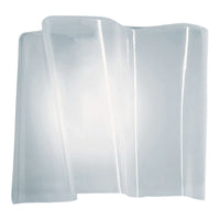 Translucent glass wall sconce with sleek, wavy design in clear color, enhancing modern decor aesthetics.