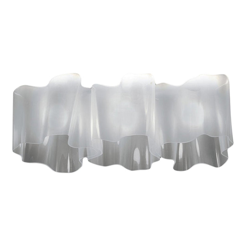 Translucent white wavy lamp shade with smooth, flowing contours and a modern design, perfect for stylish decor.