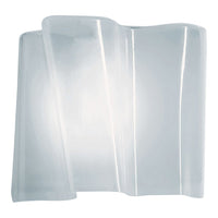 Transparent glass wall sconce with a sleek, wavy design, showcasing ethereal curves and a modern aesthetic.