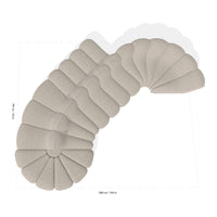 Beige fabric seating with a unique scalloped pattern, featuring smooth curves and a soft texture. Perfect for modern decor.