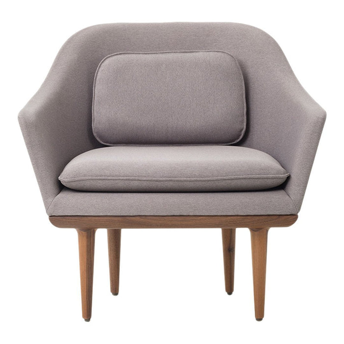 Gray upholstered accent chair with a minimalist design and wooden legs. Perfect for modern living spaces.