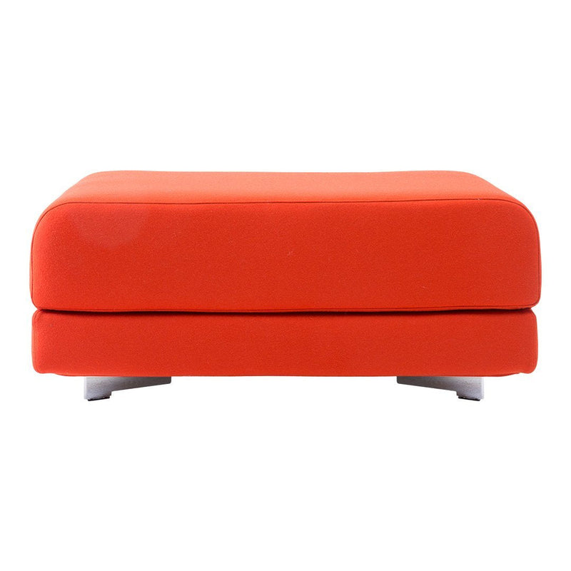 Bright orange rectangular ottoman with a smooth surface and sleek silver legs. Modern and stylish home decor accent.