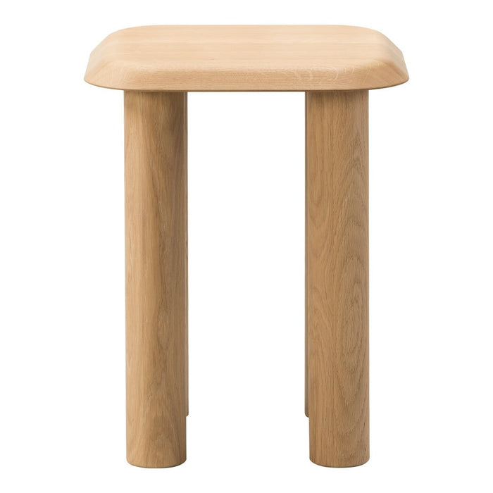 Natural wood stool with a smooth light oak finish and rounded edges, showcasing an organic minimalist design.