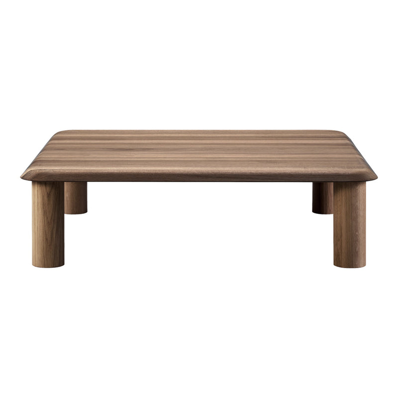 Natural wood coffee table with a warm brown finish and sleek, minimalist design. Simple, modern elegance in furnishings.