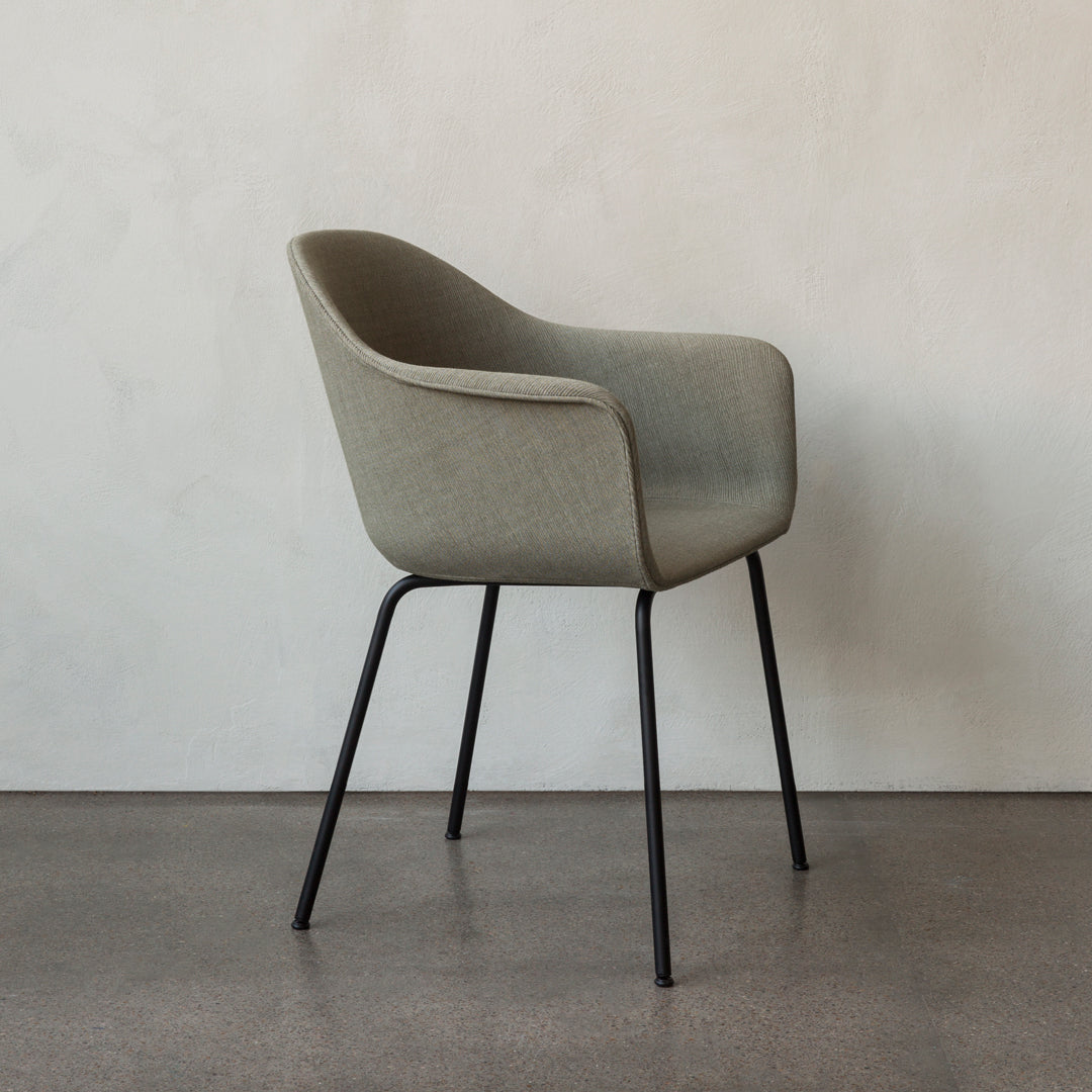 Stylish gray upholstered chair with subtle striped texture and sleek black metal legs against a neutral background.