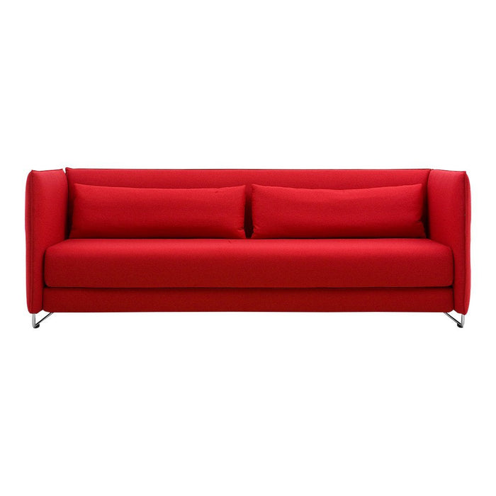 Vibrant red sofa with a sleek, modern design and smooth fabric, featuring two matching cushions.