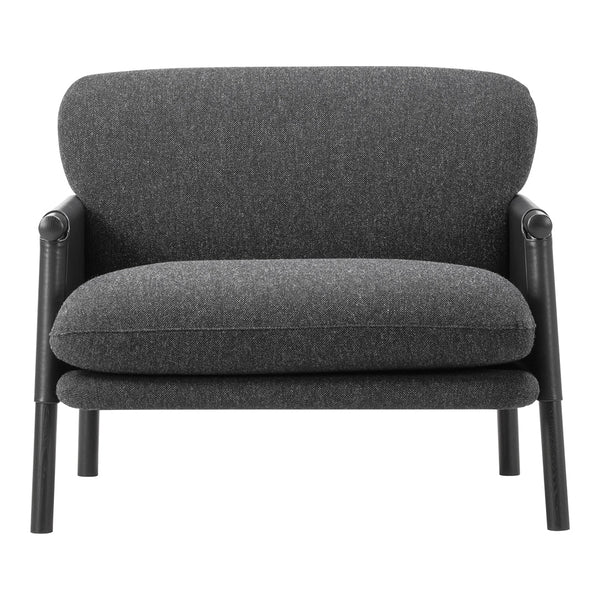 Gray upholstered chair with a smooth texture and minimalist design, featuring a solid black frame for contrast.