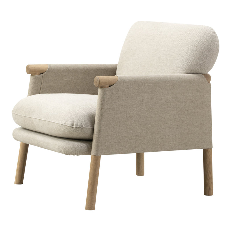 Beige upholstered armchair with smooth fabric, minimalist design, and light wooden legs for a modern look.
