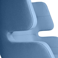 Stylish chair in soft blue fabric with smooth, modern contours and minimalistic design. Perfect for contemporary decor.