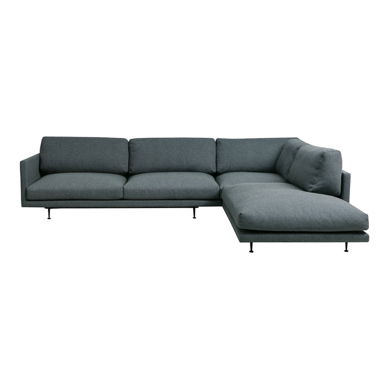Gray sectional sofa with sleek lines and minimalist design, featuring a solid color upholstery and understated elegance.