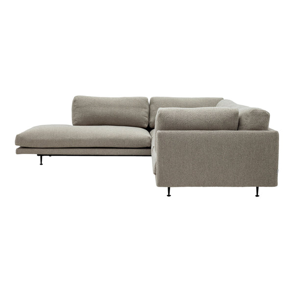 Light gray sectional sofa with a smooth, textured fabric and minimalist design, featuring clean lines and a modern look.