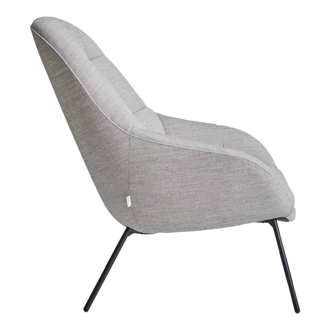 Gray upholstered chair with a sleek, modern design and subtle textural pattern on a minimalist black metal frame.