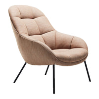 Peach-hued lounge chair with tufted upholstery and sleek black metal legs, adding a modern touch to any space.