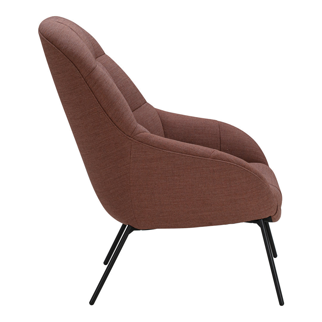 Rust-colored lounge chair with a minimalist design and smooth, rounded contours, featuring black metal legs.