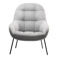 Light gray upholstered chair with a quilted pattern and black metal legs, perfect for modern decor.