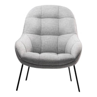 Light gray upholstered chair with a quilted pattern and black metal legs, perfect for modern decor.