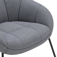 Gray upholstered chair with tufted texture and sleek, modern design; elegant pattern enhances contemporary decor.