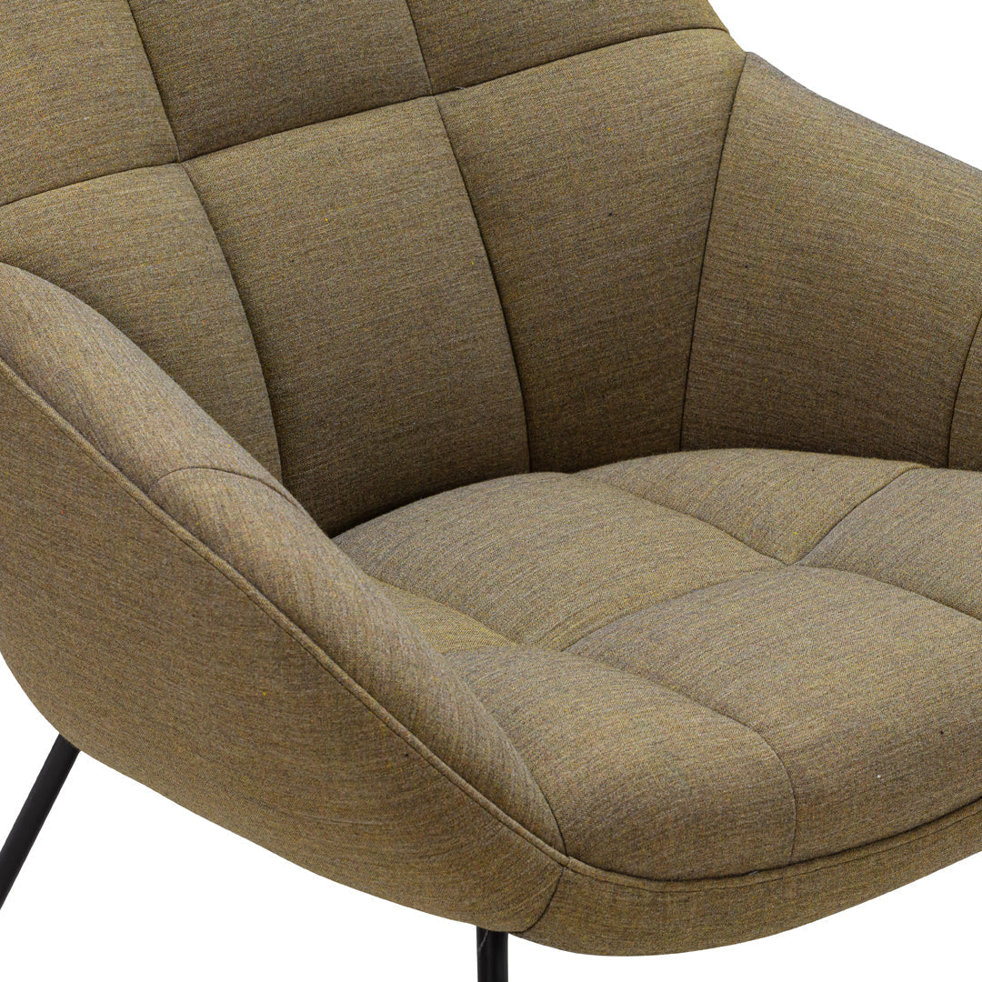 "Textured olive green chair with a modern design and subtle grid pattern on the fabric."