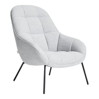 Light gray upholstered chair with subtle quilted pattern and sleek black metal legs, perfect for modern decor.