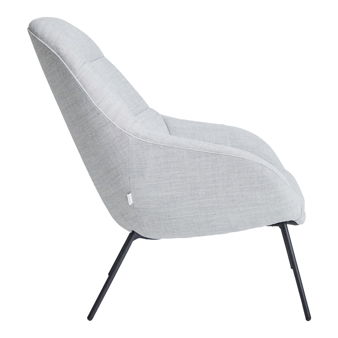 Light gray upholstered lounge chair with sleek black metal legs and a smooth, modern silhouette.