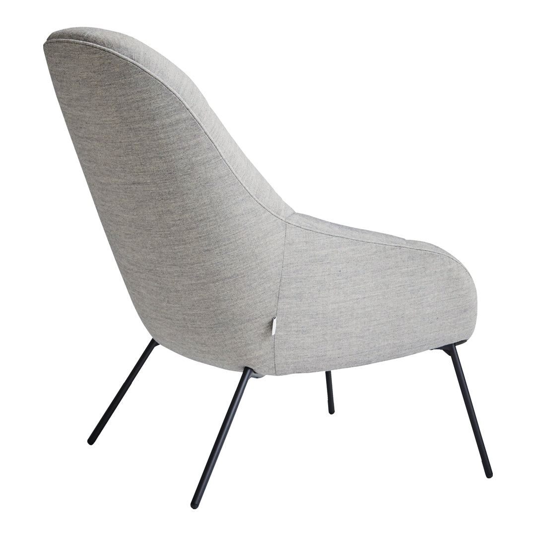 Light gray upholstered chair with a smooth texture and sleek black metal legs, showcasing a modern, minimalist design.