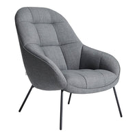 Gray upholstered chair with a tufted design and sleek black legs, perfect for modern interiors.
