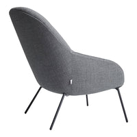 Gray upholstered chair with a smooth finish and slender black legs, showcasing a modern and minimalist design.