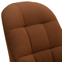 Brown upholstered chair with tufted fabric, featuring smooth curves and a warm, inviting texture.