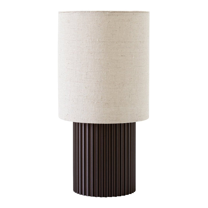 Beige linen lamp shade atop a dark brown ribbed base, showcasing a modern and minimalist design. Perfect for any decor.