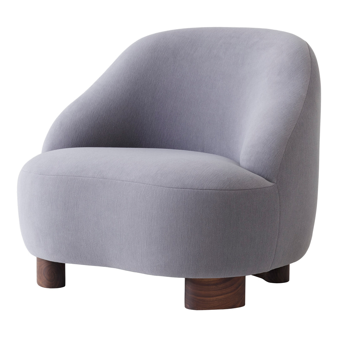 Soft gray upholstered chair with smooth, rounded shape and wooden legs for a modern, minimalist look.
