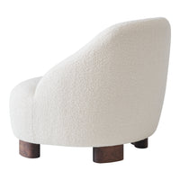 Curved cream chair with textured fabric and dark wooden legs, featuring a minimalist modern design.