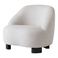 Curved light gray chair with a smooth fabric texture and black wooden legs, perfect for modern decor.
