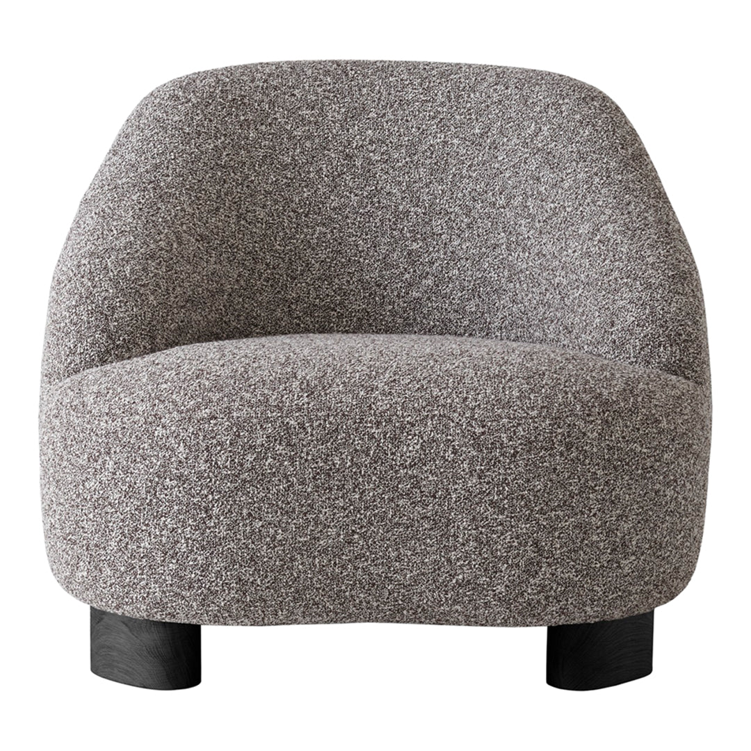 Gray textured chair with a cozy, boucle pattern and rounded design, set on black legs. Ideal for modern decor.