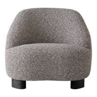 Gray textured chair with a cozy, boucle pattern and rounded design, set on black legs. Ideal for modern decor.