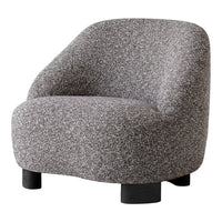Gray textured chair with soft curves and black wooden legs, featuring a cozy, minimalist design.
