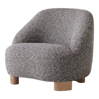 Textured gray chair with a soft finish and wooden legs, showcasing a modern and cozy aesthetic.