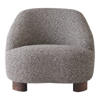Cozy gray upholstered chair with a textured fabric and rounded shape, featuring wooden legs for added warmth.