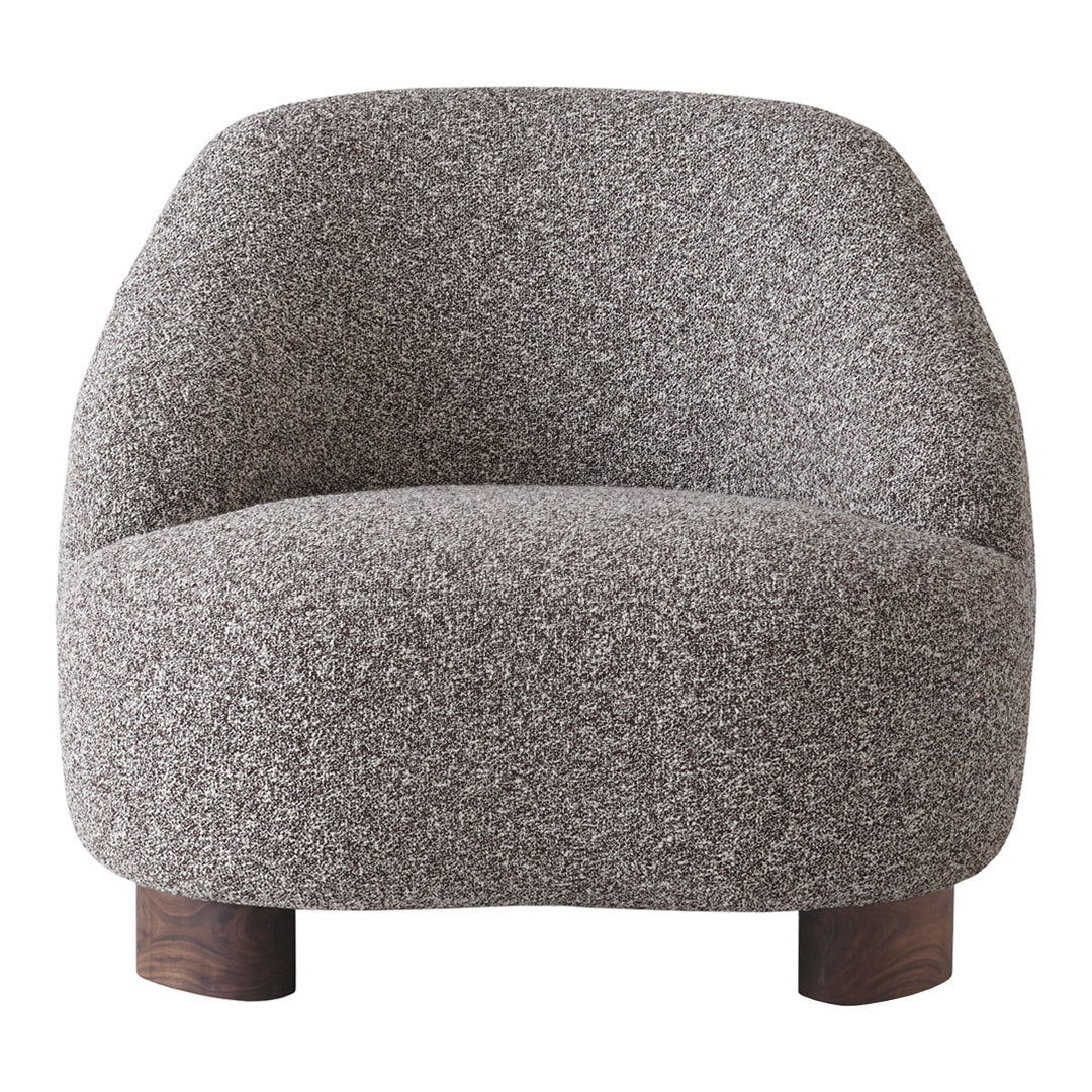 Cozy gray upholstered chair with a textured fabric and rounded shape, featuring wooden legs for added warmth.