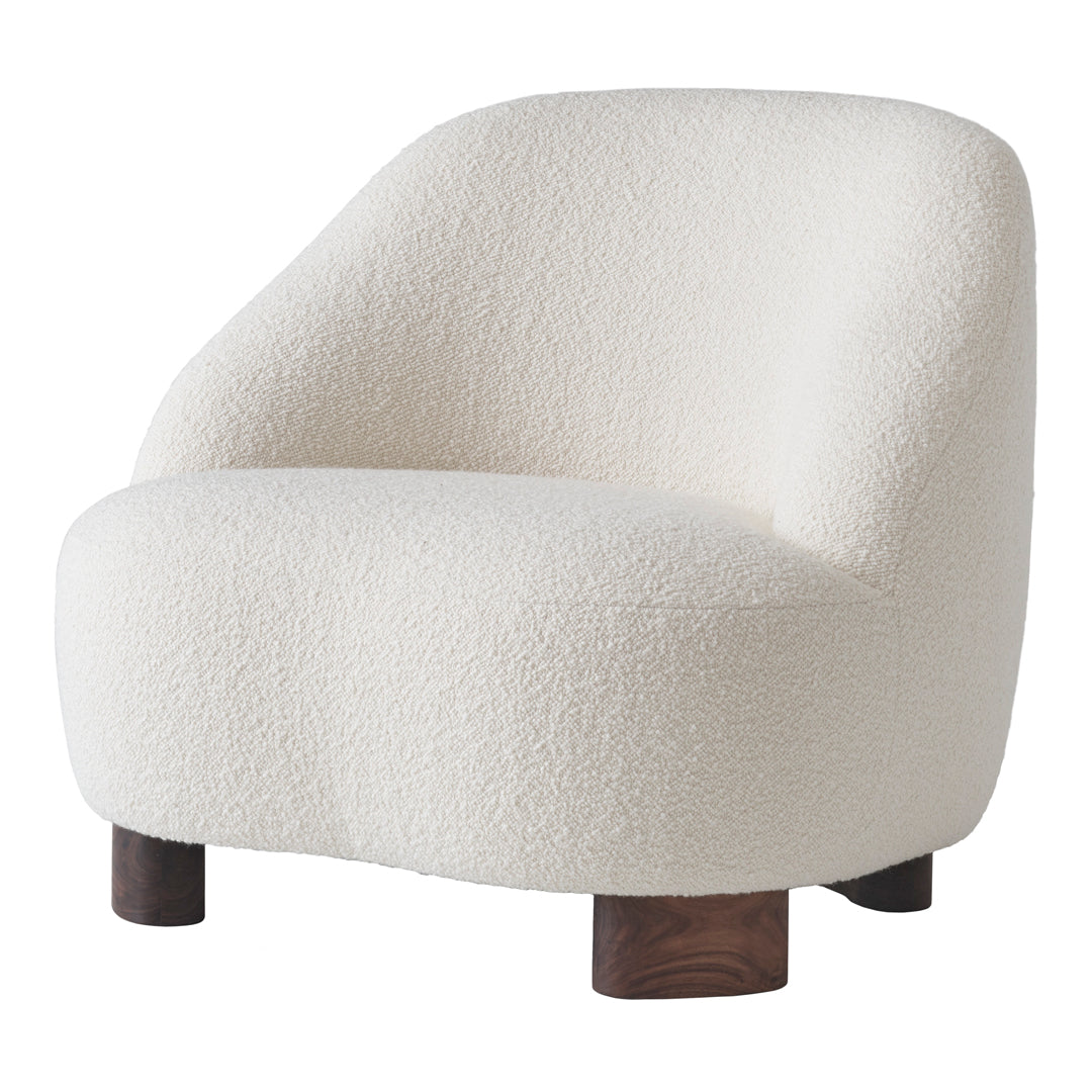 White boucle fabric accent chair with rounded shape and dark wood legs. Ideal for modern, cozy interiors.