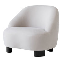 Curved white chair with a smooth texture and black legs, perfect for modern decor.