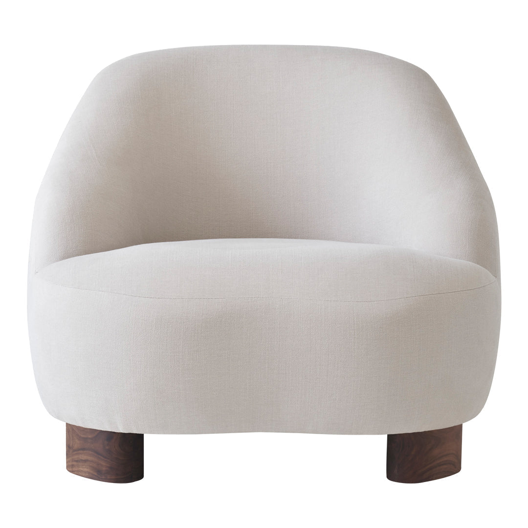 Minimalist cream armchair with a smooth texture and wooden legs. Elegant and modern design for stylish interiors.