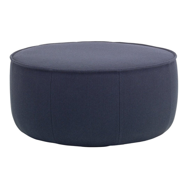 Round navy blue ottoman with a smooth, solid fabric texture and minimal stitching detail. Ideal for modern decor.