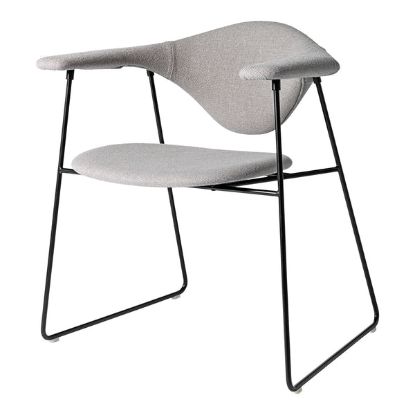 Light gray upholstered chair with a minimalist design and black metal frame. Stylish and modern for any space.