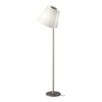 White cone-shaped lampshade on a sleek, metallic silver stand, perfect for modern decor.