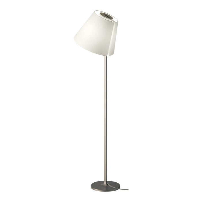 White cone-shaped lampshade on a sleek, metallic silver stand, perfect for modern decor.