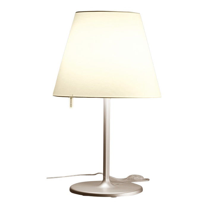 Modern white lamp with a tapered shade and sleek silver base, perfect for any contemporary decor.