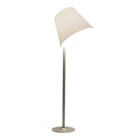 Modern white floor lamp with a sleek silver base and minimalist design, featuring a soft, neutral color palette.