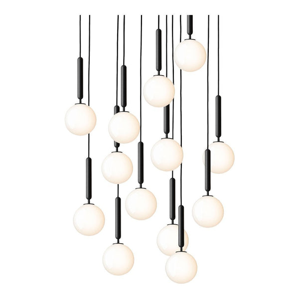 Modern pendant light fixture with black accents and white spherical bulbs in a sleek arrangement.