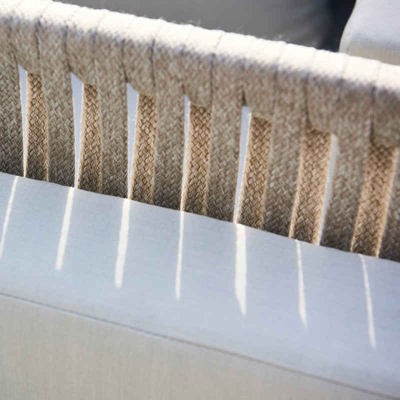 Natural beige and cream woven fabric with subtle textural patterns, perfect for modern decor accents.